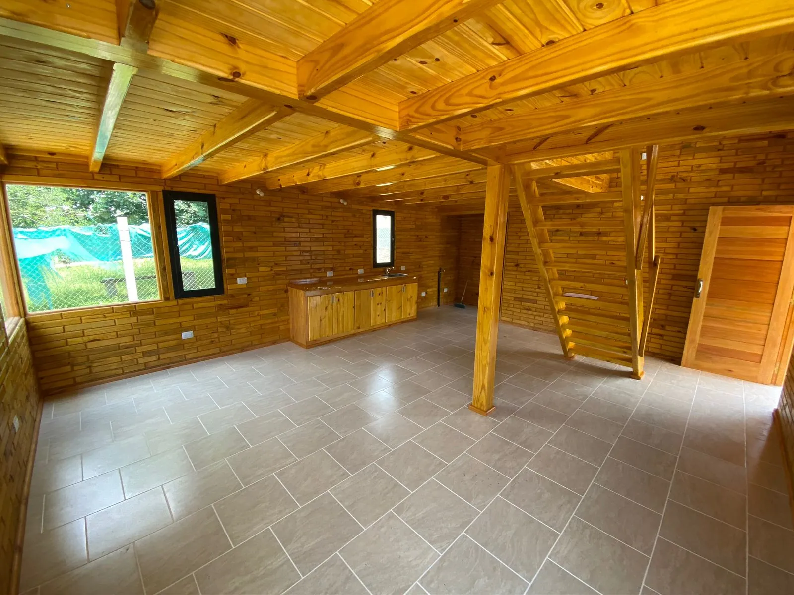 Warm natural wood interior built with the BME wooden block system